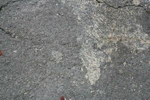 sujo cimento parede fundo, envelhecido areia parede superfície, resistido rústico parede pano de fundo foto