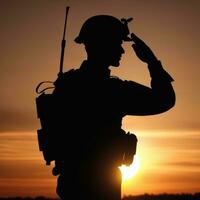 silhueta do uma soldado saudando durante pôr do sol ai gerado foto