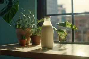 uma garrafa do leite senta em uma mesa Próximo para uma plantar foto