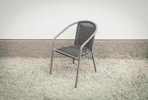 cadeira com parede vazia para espaço de cópia - filtro de efeito vintage foto