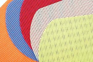 uma grupo do colorida polca ponto tecido foto