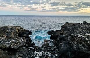 rochoso de praia em a canário ilha do tenerife foto