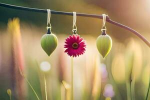 três brincos com uma flor suspensão a partir de eles. gerado por IA foto