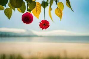 dois flores suspensão a partir de uma ramo perto a de praia. gerado por IA foto