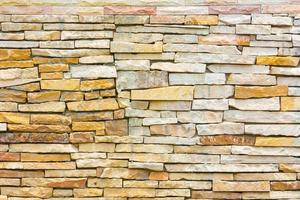 parede de tijolos desordenada ou irregular, fundo de textura foto