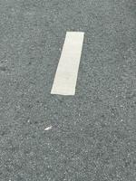 fechar acima branco asfalto calçada textura foto