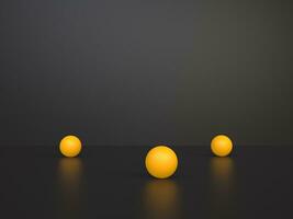três amarelo esferas em Preto reflexivo fundo foto