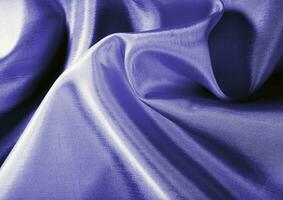profundo azul lustroso pano textura fundo. natural têxtil material foto, padronizar cobrir foto