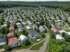 uma Vizinhança com grande quantidade do casas dentro a meio. ai gerado foto