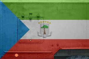 equatorial Guiné bandeira retratado em lado parte do militares blindado caminhão fechar-se. exército forças conceptual fundo foto