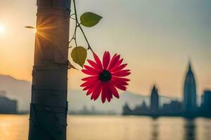 uma vermelho flor é suspensão a partir de uma árvore perto a água. gerado por IA foto