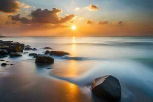 a Sol sobe sobre a oceano e pedras em a de praia. gerado por IA foto