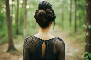 uma lindo noiva com uma pão penteados para grandes cabelo Veja a partir de voltar. uma fêmea Penteado traseiro Visão conceito de ai gerado foto