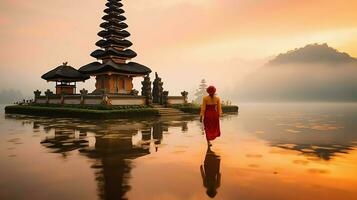 antigo pura Ulun danu bratan, besakih ou famoso hindu têmpora e turista dentro bali ilha às nascer do sol conceito de ai gerado foto