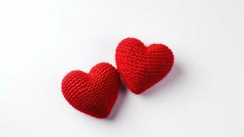dois tricotado vermelho corações em uma branco fundo. dia dos namorados dia. foto