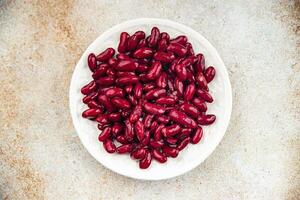 vermelho feijões legumes pronto para comer Aperitivo refeição Comida lanche em a mesa cópia de espaço Comida fundo foto