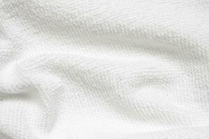 fundo abstrato de textura de toalha de tecido de algodão branco foto