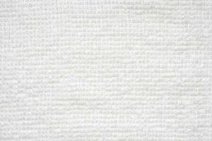 fundo abstrato de textura de toalha de tecido de algodão branco foto