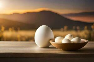ovos dentro uma tigela em uma mesa com montanhas dentro a fundo. gerado por IA foto