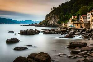 uma grandes exposição fotografia do uma rochoso litoral e edifícios. gerado por IA foto