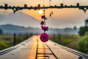 uma flor suspensão a partir de uma ponte às pôr do sol. gerado por IA foto