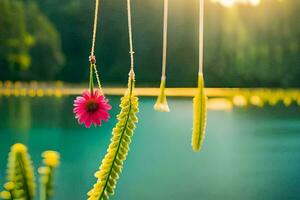 uma flor suspensão a partir de uma corda de uma lago. gerado por IA foto