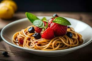 espaguete com morangos e amoras dentro uma branco tigela. gerado por IA foto