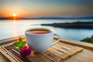 uma copo do chá em uma bambu esteira com uma Visão do a pôr do sol. gerado por IA foto