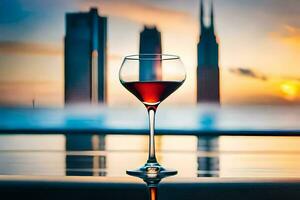 uma vidro do vermelho vinho é sentado em uma mesa dentro frente do uma cidade Horizonte. gerado por IA foto