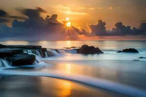 uma lindo pôr do sol sobre a oceano com pedras e água. gerado por IA foto