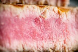 bife atum grelhado. macro fundo. foto