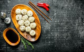 manta dumplings com soja molho, alecrim e Pimenta Pimenta. foto