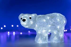 brilhando polar Urso em uma azul fundo com luzes foto