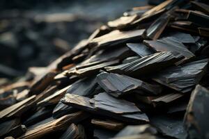 uma pilha do Preto madeira salgadinhos em a terra generativo ai foto