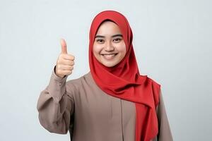 hijab mulher com polegar acima gesto em branco fundo ai gerado foto