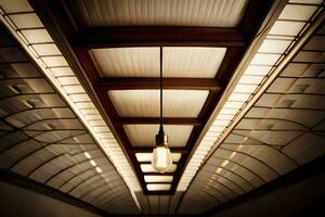 uma luz lâmpada trava a partir de a teto do uma túnel. gerado por IA foto