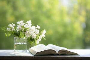 jasmim flores dentro uma vaso e aberto livro em a mesa, verde natural fundo. ai gerado foto