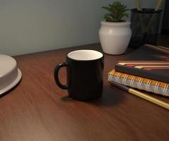 caneca de café preta em uma maquete de mesa