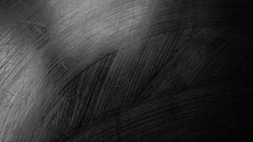 quadro-negro lavado. quadro-negro molhado. textura de um fundo preto foto