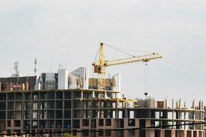 industrial fundo fez do guindaste construção às a edifícios fundo às a construção área foto