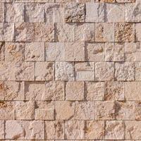 textura da parede de pedra de azulejos brancos. foto