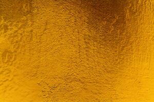 dourado parede gesso brilhar textura foto