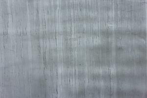 concreto ao ar livre parede com fosco cinzento pintura e branco e Preto manchas - quadro completo fundo e plano textura foto