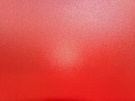 fundo de revestimento de tinta em pó shagreen vermelho na superfície plana de chapa de aço foto