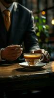 sentado homem de negocios com aromático café em uma de madeira mesa, pires vertical Móvel papel de parede ai gerado foto