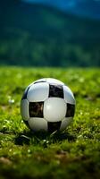 futebolistas essência, bola preparado em a campo, pronto para açao vertical Móvel papel de parede ai gerado foto