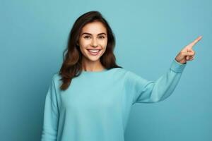 alegre jovem lindo e à moda fêmea modelo posando contra azul fundo ai generativo foto