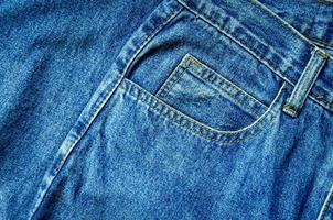 jeans azul e jeans não têm textura na mesa, jeans são sobrepostos. foto