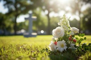 branco flores dentro frente do uma lápide às uma cemitério com pôr do sol.funeral conceito ai gerado foto