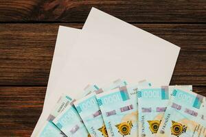 ucraniano dinheiro hryvnias em a mesa com documentos com uma Lugar, colocar para texto. foto